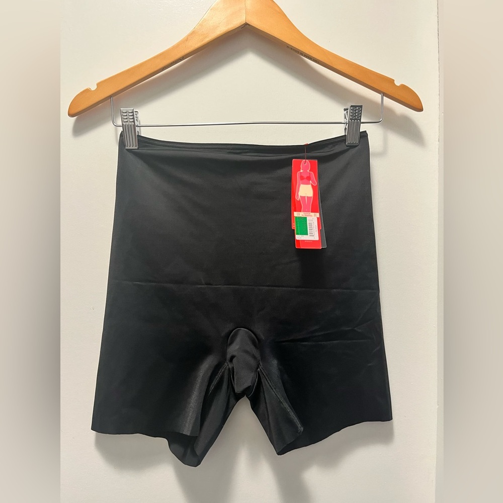 Never worn Spanx size L